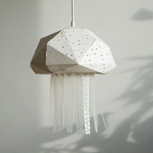 A lamp shaped as jellyfish,  hanging in Nursery or Bedroom, made of white paper-like fabric.