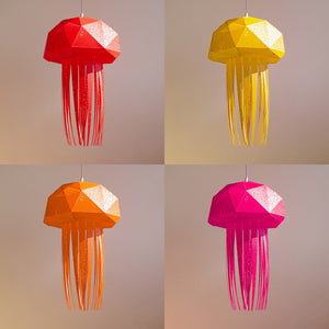 Four different colors of mesmerizing jellyfish shaped Nautical Ceiling Lamp gracefully suspended from ceiling.