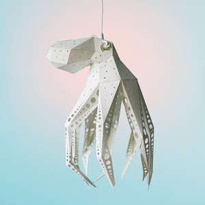 Octavio the Octopus Light by Vasili Lights, an eco-friendly paper decoration, hangs gracefully from a string.
