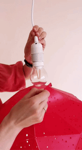 Video shows how to attach Nautical Ceiling Lampshade to a lighting fixture.
