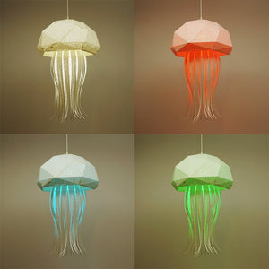 Four colors of Nautical Hanging Jellyfish Light inspired by origami, made of eco-friendly paper-like fabric by Vasili Lights.