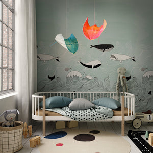 A children's room with a bed, a bedside table, and a calming light Vasili Lights Ray Origami Lamp for Nursery and Kids' Room.